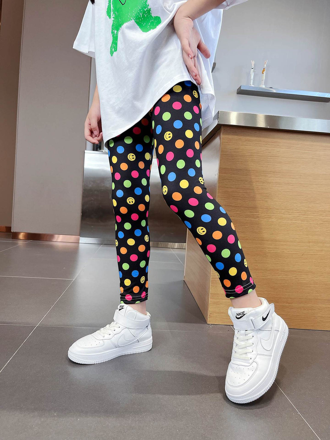 Smiley en stippen: trendy legging voor meisjes
