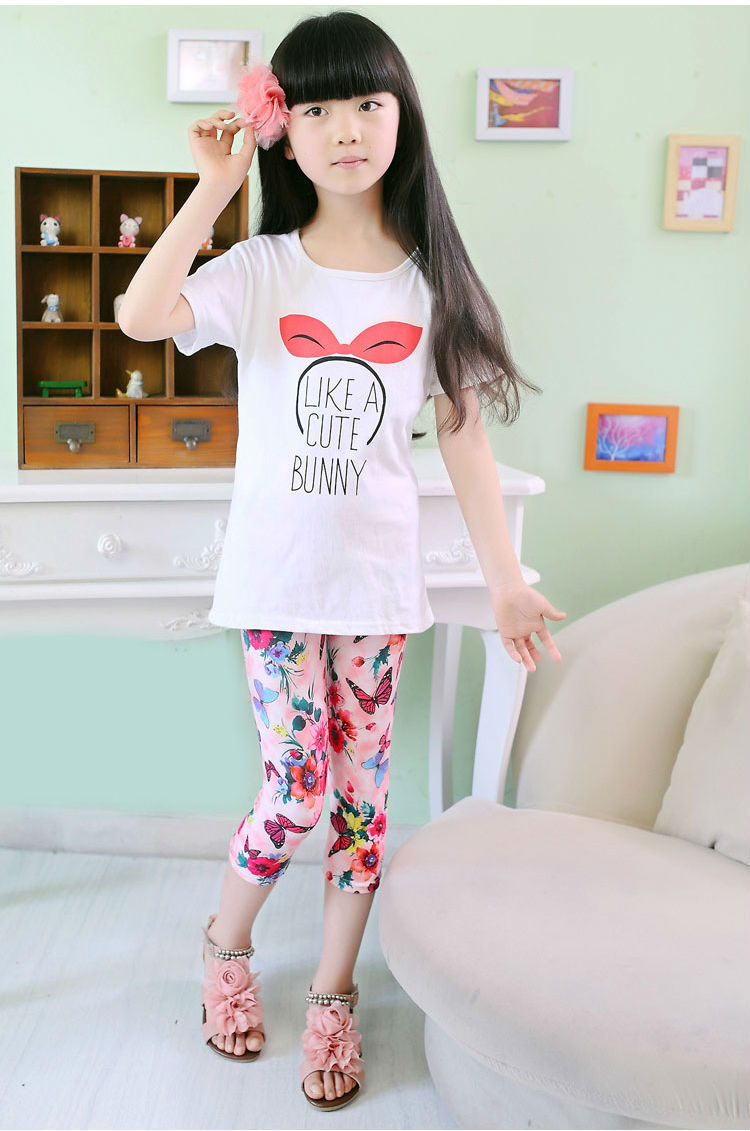 Roze capri legging met vlinder print